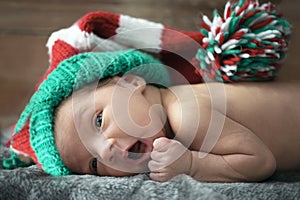 Newborn baby wearing a Christmas