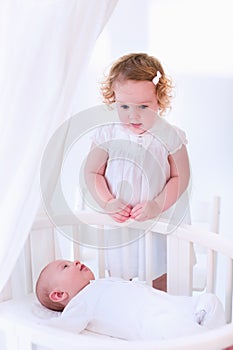 Newborn child meets his sister