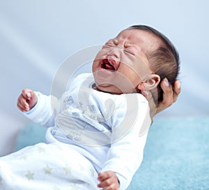 Newborn, crying and cleft palate with parent, mom and home with tears, sick and frustrated. Medical child, syndrome and