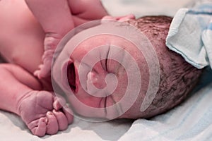 Newborn crying in delivery room