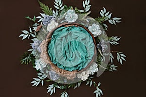 Newborn digital background - brown wooden bowl with green leaves wreath and  teal flowers