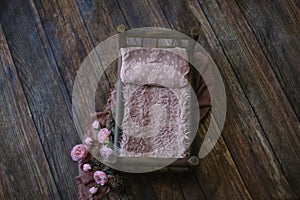 Newborn digital background - dark wooden bed with pink faux fur and lace pillow on dark wooden floor mat with jute and pink layer