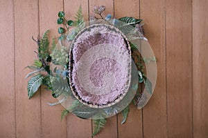 Newborn digital background - natural woven bowl with pink faux fur and tropical garland wreath with succulent plants, eucalyptus