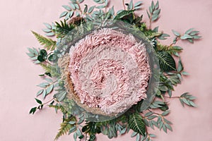 Newborn digital background - wooden bowl with pink faux fur on jute layer and pink backdrop and green leaves wreath