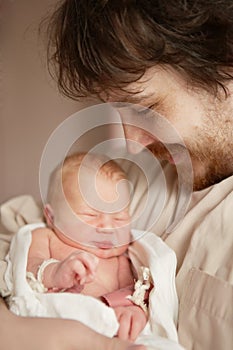 The newborn girl and her father