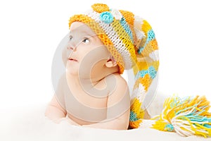 Newborn hat baby portrait in woolen cap over white background