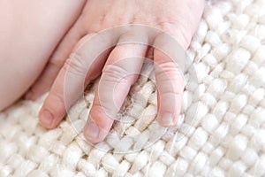Newborn / Infant hand, fingers and fingernails close-up macro