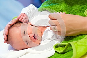 Newborn and mother's hands