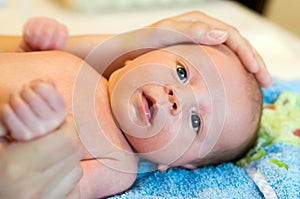 Newborn and mother's hands