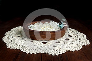 Newborn photography background with wood bowl and beige crochet