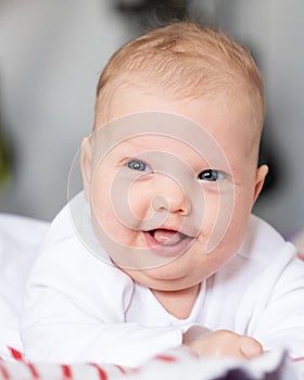 Newborn smiling baby portrait