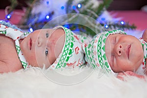 Newborn twin baby boys sleeping