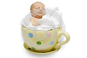 Newborn in yellow cup