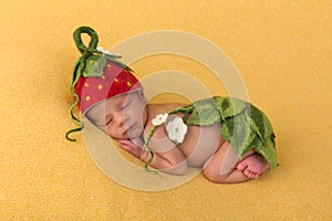 Newbornbaby with strawberry hat