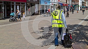 Woman wearing Corvid-19 jacket