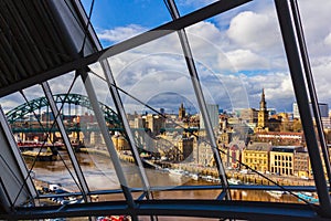 Newcasstle city Skyline through Sage Gateshead windows at Newcastle Quayside