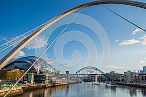 Newcastle Gateshead Quayside with River Tyne, Gateshead Millenium Bridge, Sage Gateshead concet hall and Tyne Bridge in view