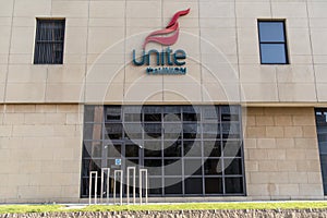 Exterior of Unite the Union Headquarters building in Newcastle showing logo, sign and branding