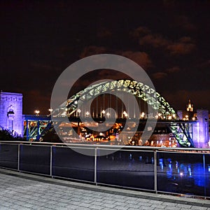 Newcastle Tyne bridge lit up at night