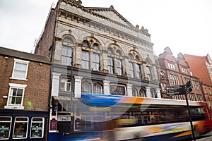 Newcastle Tyne Theatre building exterior with Stagecoach bus moving past