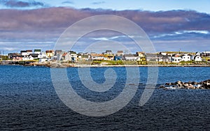 Newfoundland colourful beach homes along the rocky East Coast of Canada at Bonavista