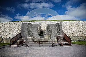 Newgrange entrance with view of the famous Triple Spiral and Diamonds designs