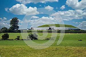 Newgrange passage tomb with nice clouds in the sky