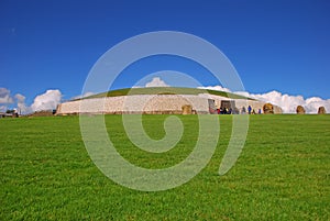 Newgrange prehistoric monument, a large circular mound with an inner stone passageway & chambers in County Meath, Ireland