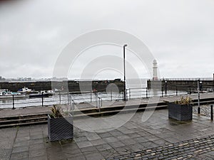 Newhaven harbour and lighthouse Edinburgh Scotland photo