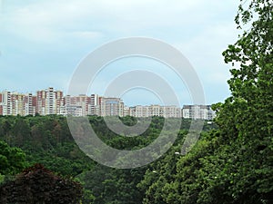 Newly built block of eco flats in middle of green forest