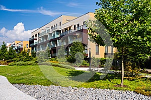 Newly built block of flats with green area around