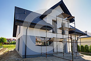 Newly built house with a finished plaster