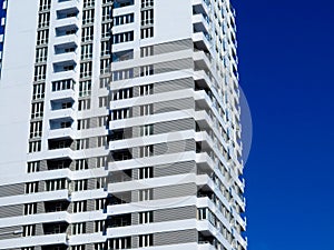 Newly built houses in the newly built area of the city. Perspective construction of apartments. Infrastructure and industry.