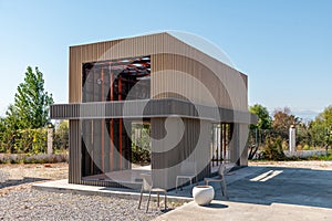 Newly built metal framed building with siding. Construction of a new tiny house. selective focus