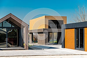 Newly built metal framed building with siding. Construction of a new tiny house. selective focus