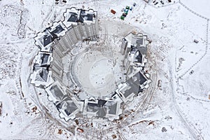 Newly constructed high-rise apartment buildings in residential area. aerial view in wintertime