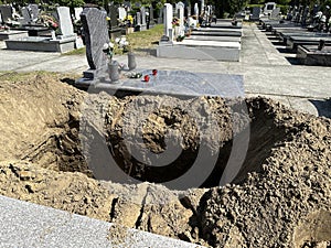 Newly dug out grave site in the public cemtery