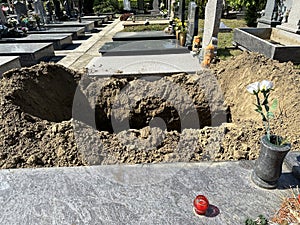 Newly dug out grave site in the public cemtery