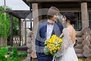 Newly married ready to enter in luxurious wooden mansion