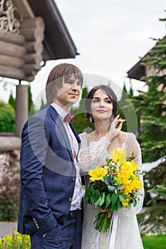 Newly married ready to enter in luxurious wooden mansion