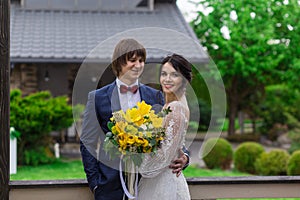 Newly married ready to enter in luxurious wooden mansion