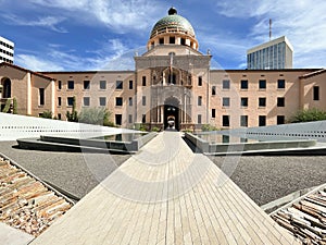 Newly renovated Old Pima County Courthouse with modern fountain