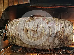 newly unwrapped doner kebab on a skewer