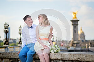 Newly-wed couple on Alexandre III bridge in Paris