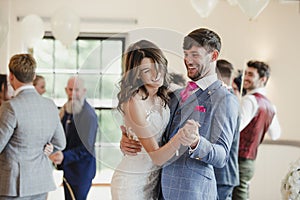 Newly Wed Couple Dancing With Their Guests