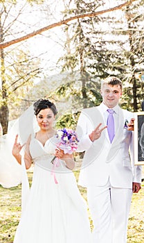 Newly wed couple going crazy. Groom and bride