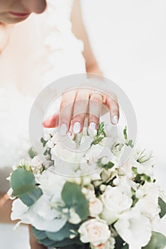 Newly wed couple`s hands with wedding rings