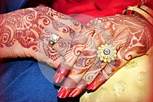 Newly wed couple`s hands with wedding rings