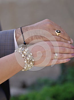 Newly wed couple& x27;s hands  with wedding rings