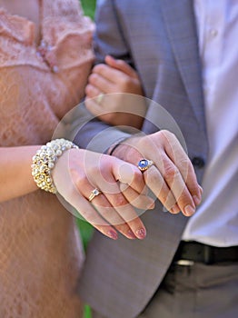 Newly wed couple& x27;s hands  with wedding rings photo